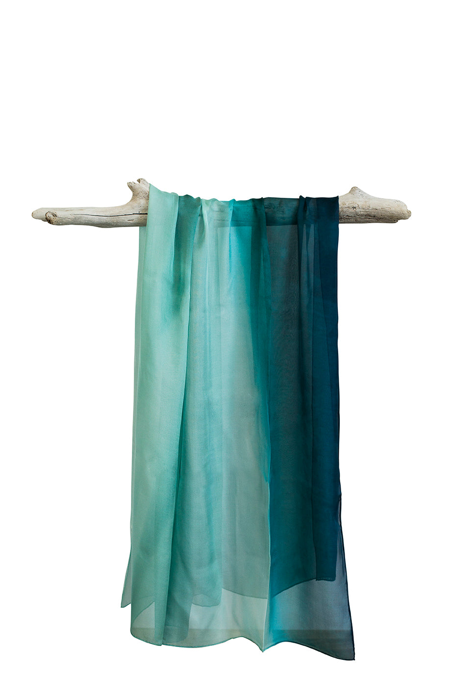 Silk Sarong Comet Print of a small boat in the distance replicates a comet amongst the sand and blue green water swirling together