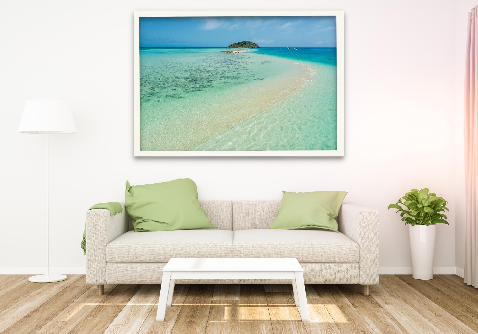 small mountain island on the horizon with sandbar snaking its way to the island with turquise waters eitherside