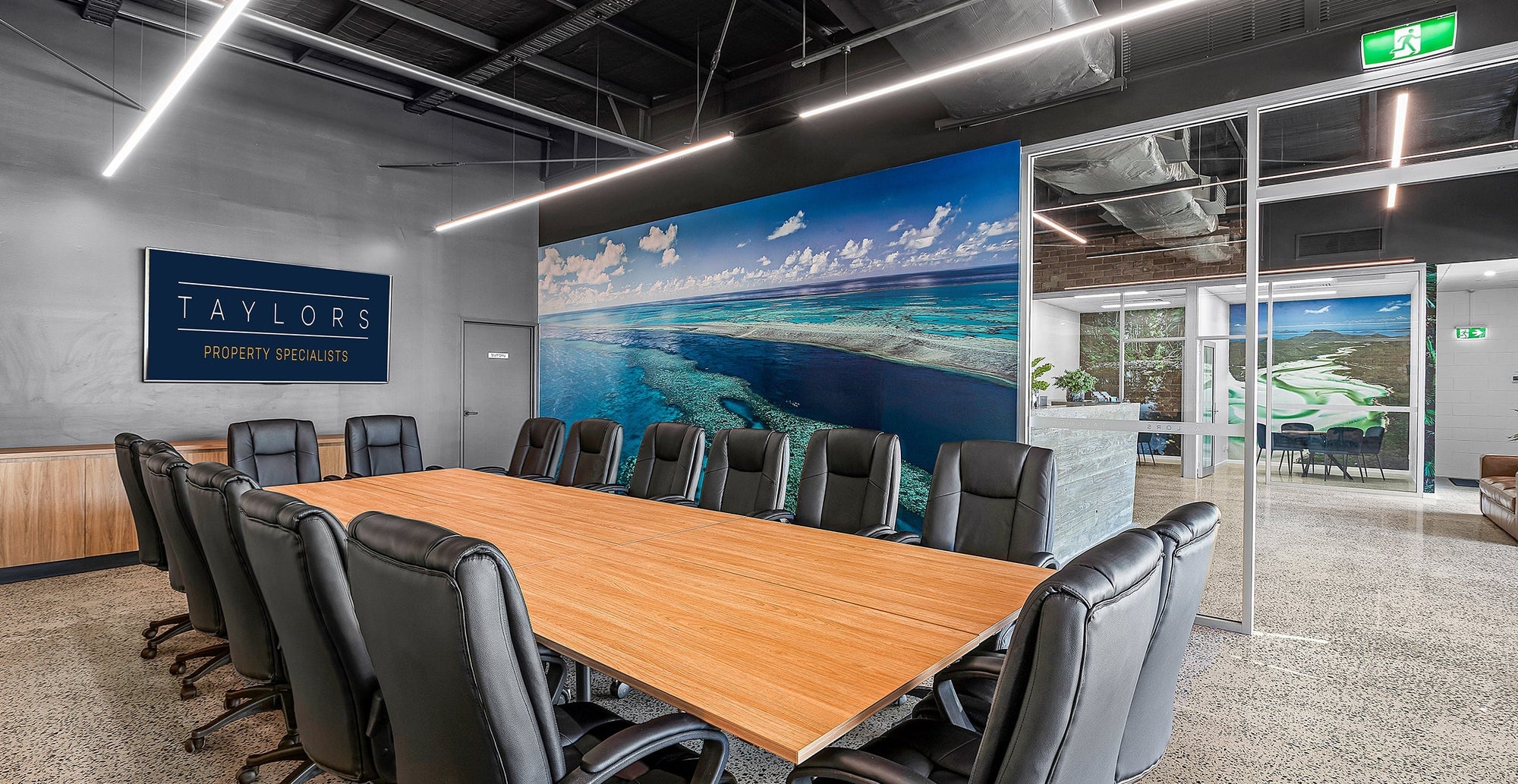 taylor property specialists conference room with waterway print