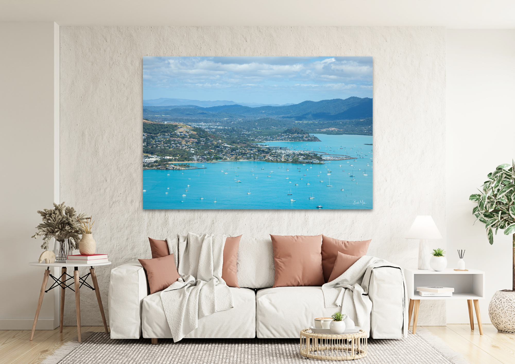 large heart shaped coral reef island surrounded by turquise water and more reef