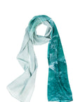 Silk scarf White Waves print from right the turquiose water waves lap at the white sand on left 